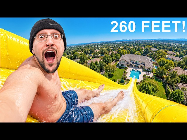 Riding the BIGGEST INFLATABLE Water Slide!
