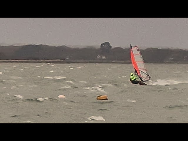 Windsurf gybe in gusting 40 knots