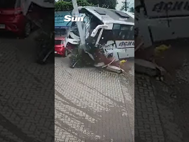 Moment coach CRASHES into petrol station