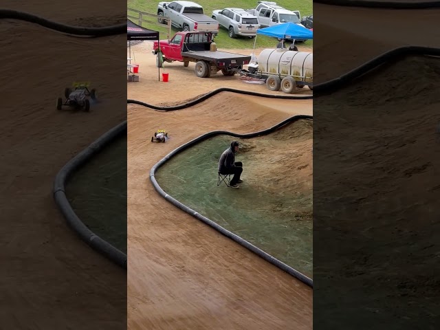 Radio Controlled Truggy ripping around off road track