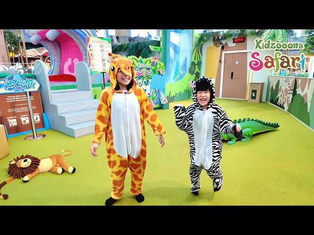 Play on the Rope Slide Wearing Animal Costumes Giraffe Elephant Lion Children's Playground