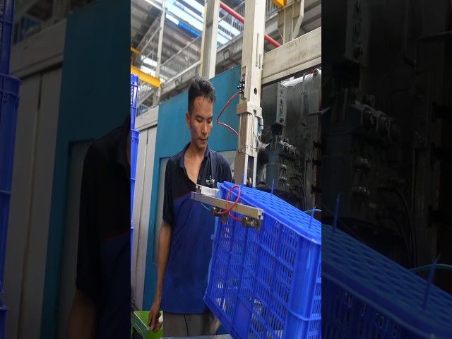 Mass production of plastic products. Plastic crates manufacturing process in Vietnam.