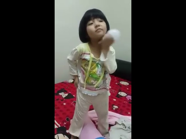 Little Girl Magically Turn On Light Bulb with Touch