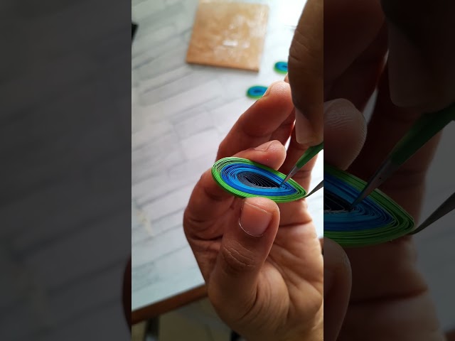 Peacock feather design with paper quilling.. #peacock #peacockfeathertattoo #greetingcard