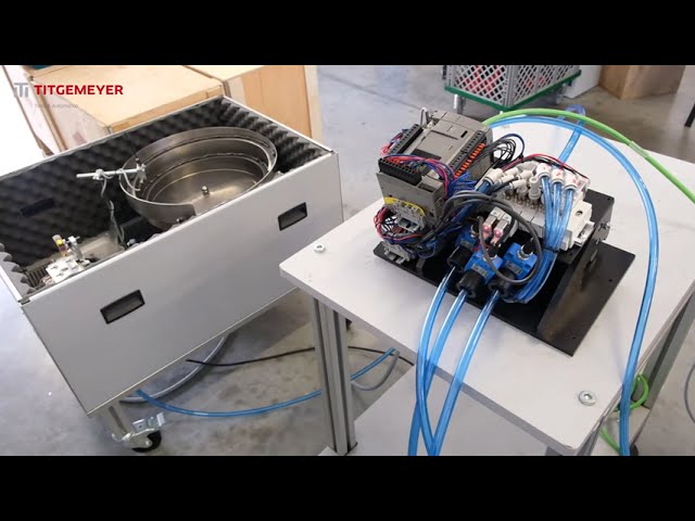 Riveting automation for production_3 riveting heads 1 vibratory bowl feeder
