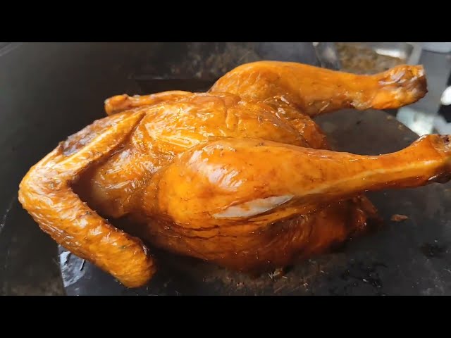 BBQ grilling whole duck or chicken, not dog meat. 