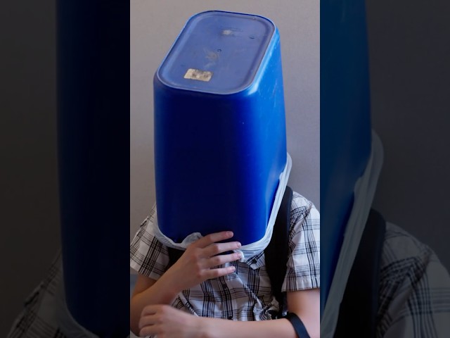 They put a trash can in his head