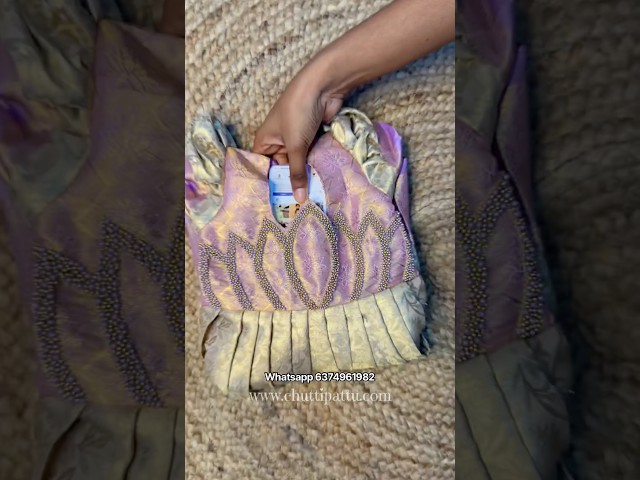 🔗: https://chuttipattu.com/products/lavender-beauty-kanchi-tissue-silk-lotus-aari-work-gown-cpm0628