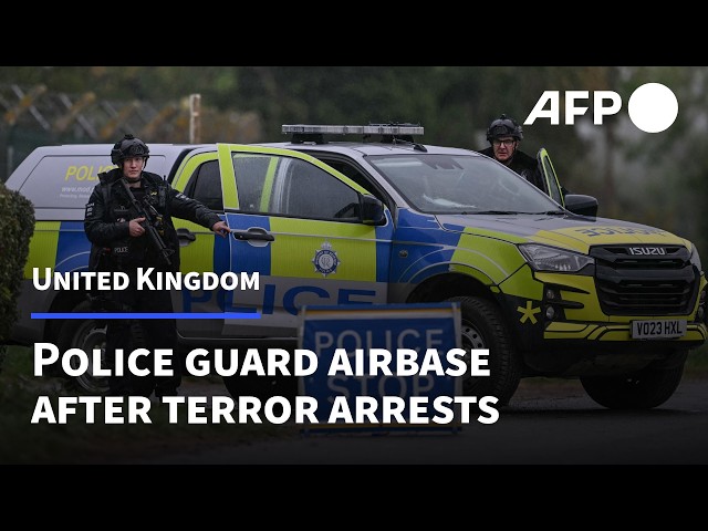 UK police stand guard outside RAF base as major incident probed | AFP