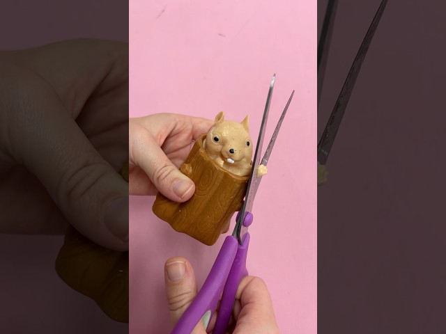Cutting a squirrel fidget toy with ​⁠@MrsBench