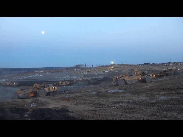 Fleet of 657 scrapers in the giant cut