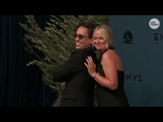 Marcello Hernández, Amy Poehler hug on 2026 Emmys red carpet