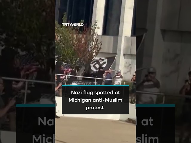Protesters with Nazi flag seen leading anti-Muslim rally in Michigan