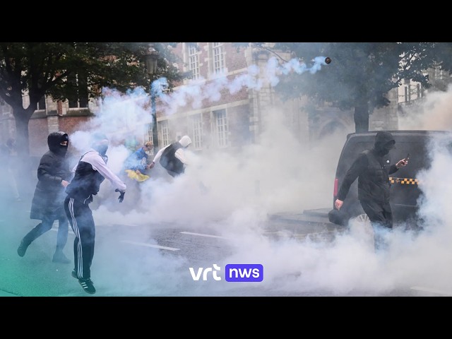 Police deploy water cannon and tear gas against rioters at demonstrations in Brussels
