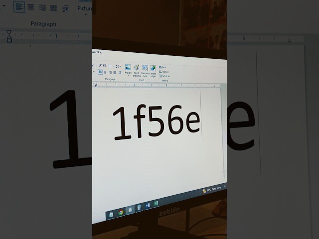 How to Create an Open Book Symbol in WordPad