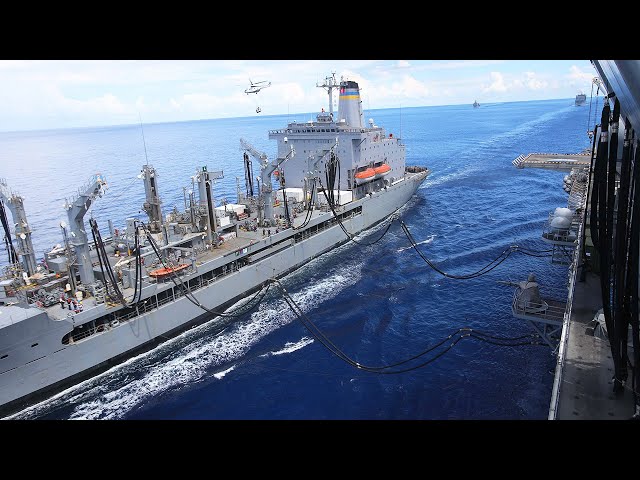 US Navy Ships Conduct Replenishment at Sea