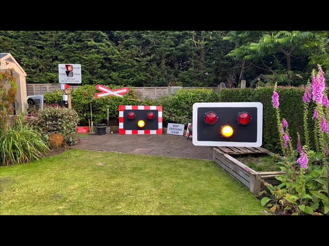 (Hobbyist Project) Level Crossing Wigwags and Miniature Stop Light in Backyard