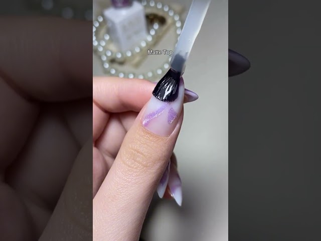 Tie a bow on perfection with these ribbon cat-eye nails 🎀💅