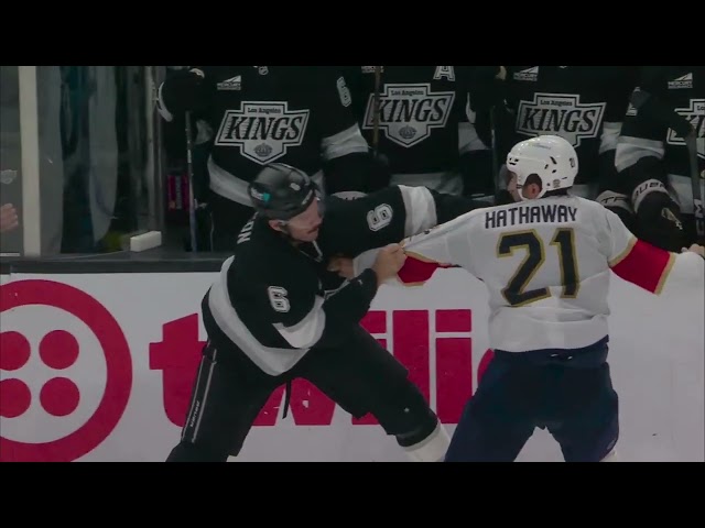Joel Edmundson drills Garnet Hathaway and the two immediately drop the gloves.