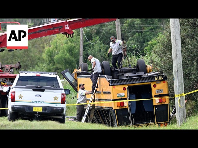 2 dead, including a student, after Florida school bus flips over in crash