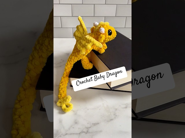 I made the cutest dragon for fantasy bookshelves 💛🐉📚