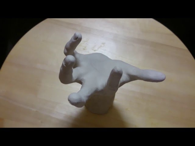 Twin Flames' hand in clay
