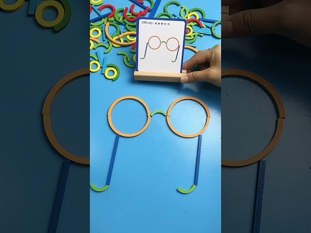 Look Sonu, I'm making a pair of glasses from these colorful plastic blocks.#short