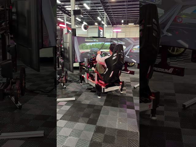 Rubbing is racing! Testing out this $70,000 racing simlulator