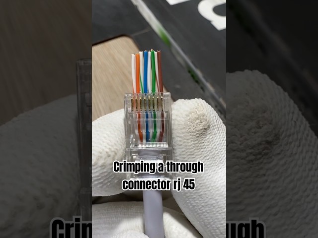 Crimping a through connector rj 45