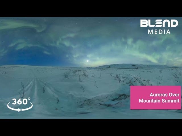 Aurora Over a Mountain Summit