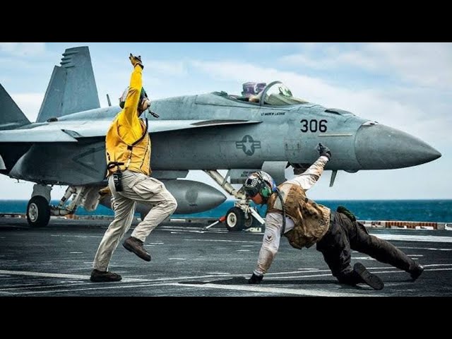 The Insane Hand Signals on an Aircraft Carrier Flight Deck Explained
