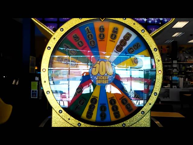 Wheel of Fortune Coin Pusher. Cleaned out the whole machine. (Literally)