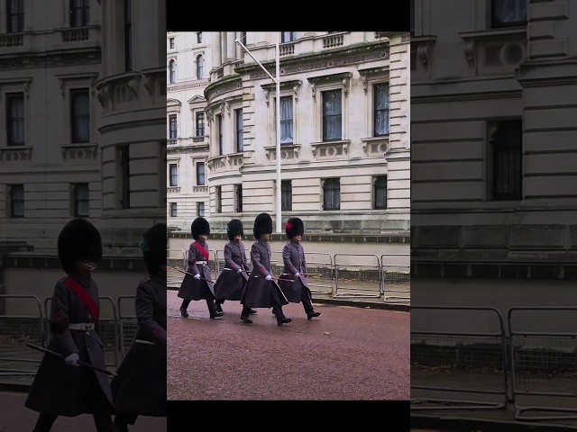 King's Guards march to the National Service of Remembrance at The Cenotaph.
