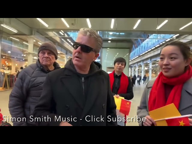 Dr K (Brendan Kavanagh) vs Chinese film crew. Public piano St Pancreas station ￼London.